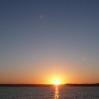 The sunset across St Austell Bay from Polkerris