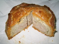 The succulent insides of a glorious pork pie from Dickinson & Morris Ye Olde Pork Pie Shoppe in Melton Mowbray