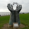 Hands & Molecule by David Barnes on the cliff top at Ramsgate