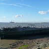 An old boat rotting away on the River Thames