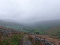 Descending out of the low cloud from Great Shunner Fell into Thwaite