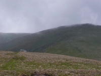 Looking back to the mountain hut, and The Cheviot in the low cloud