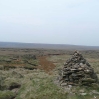 A cairn and path near Grains Moss