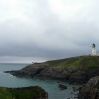 Lighthouse (and foghorn) at Black Head, before the path heads East