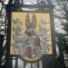 A coat of arms on the gateway to Oldlands Hall