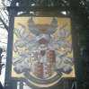 A coat of arms on the gateway to Oldlands Hall