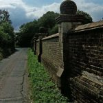 The wall near Flint House, the round brick balls are fabulous